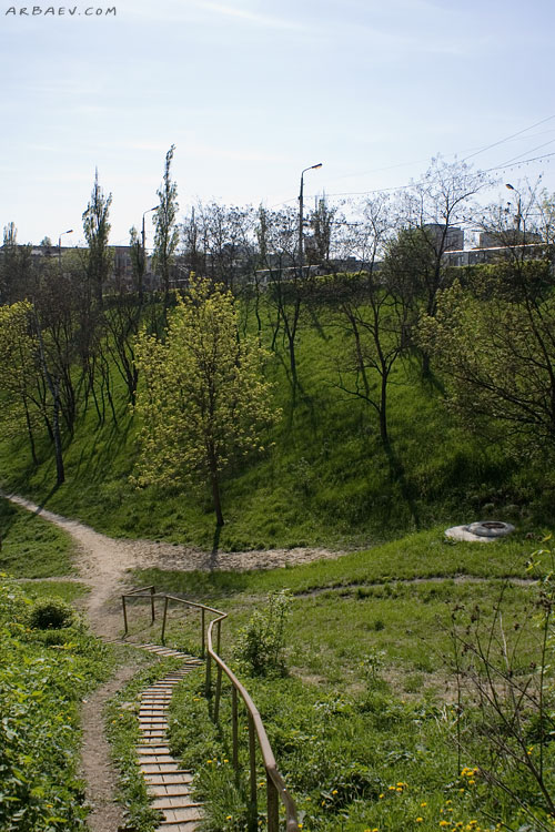 В овраг